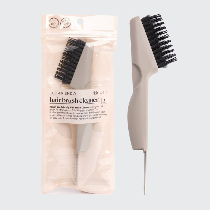Nettoyant écologique pour brosse à cheveux KITSCH avec poignée beige, brosse à poils noirs et pointe métallique, présenté sur fond blanc.