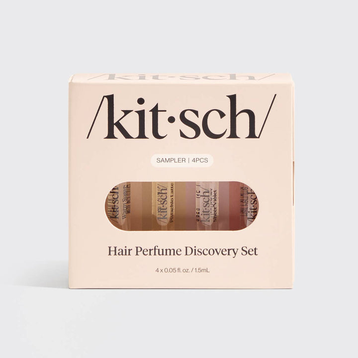 Coffret découverte KITSCH ouvert présentant quatre parfums pour cheveux en format voyage, idéal pour tester les fragrances ou offrir en cadeau.