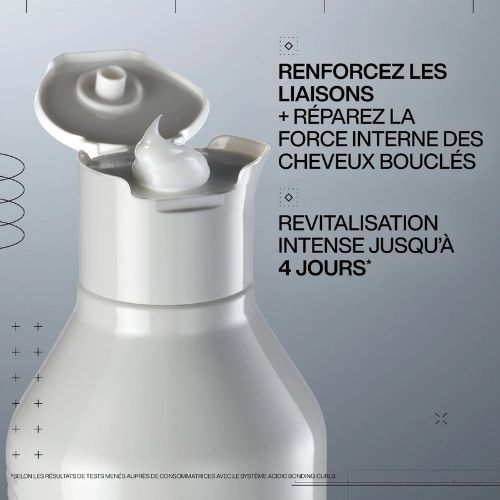 Bouteille ouverte REDKEN Acidic Bonding Curls montrant la texture crème avec texte renforçant les liaisons et revitalisation des cheveux bouclés.