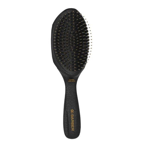 Brosse Combo Wave avec poils ioniques et végétaliens, poignée ergonomique et coussin amovible.