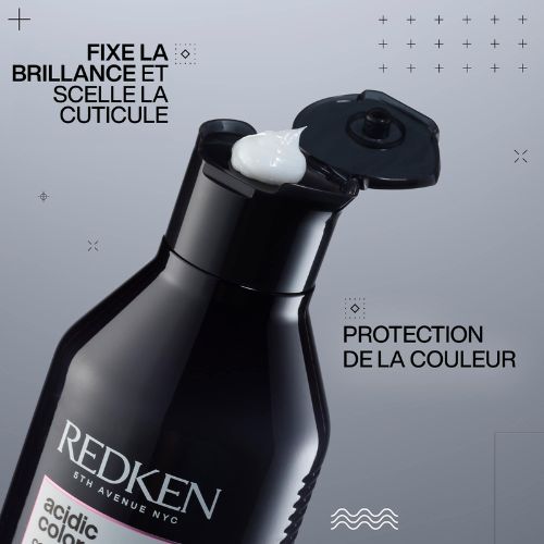Bouteille ouverte REDKEN Acidic Color Gloss montrant une crème blanche sur le bouchon avec texte protection de la couleur et brillance.