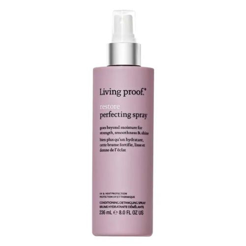 Flacon rose mat de 236 ml du Restore Perfecting Spray de Living Proof avec embout vaporisateur argenté. Brume hydratante sans rinçage qui démêle, fortifie et protège les cheveux, sur fond blanc