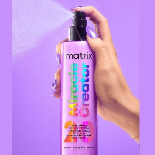 Bouteille rose-violette de 200 ml du traitement Miracle Creator de Matrix. Soin sans rinçage multifonction 20-en-1 pour tous types de cheveux