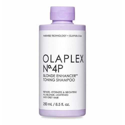 Shampoing OLAPLEX No.4P 250 ml – bouteille mauve avec étiquette blanche , posée sur fond blanc. Shampoing violet déjaunissant, hydratant et fortifiant pour cheveux blonds et gris.