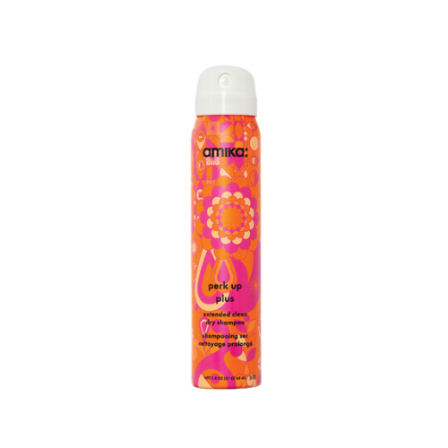 Flacon de shampoing sec Perk Up Plus, pour des cheveux frais et volumineux avec un parfum gourmand de vanille et agrumes.