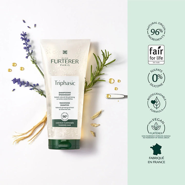 Tube shampoing Triphasic René Furterer entouré de lavande, romarin et racine de ginseng, avec icônes formule naturelle 96%, sans silicone, vegan, fond vert et blanc
