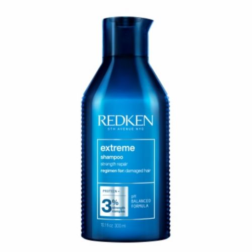 Shampooing Redken Extreme format de 300 ml  en bouteille bleue , soin fortifiant pour cheveux abîmés aux protéines, présenté sur fond blanc minimaliste.
