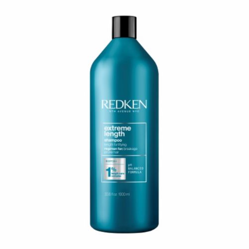 Shampooing Redken Extreme Length format 1 litre en grande bouteille turquoise, soin professionnel à la biotine pour cheveux longs et cassants, favorise la pousse et réduit la casse.