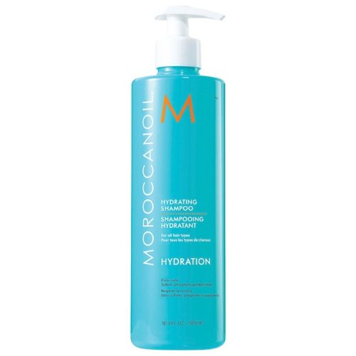 Bouteille turquoise de 500 ml du shampoing hydratant Moroccanoil avec bouchon blanc, posée sur fond blanc. Soin nourrissant à l’huile d’argan pour cheveux secs ou colorés, format intermédiaire idéal pour un usage quotidien.