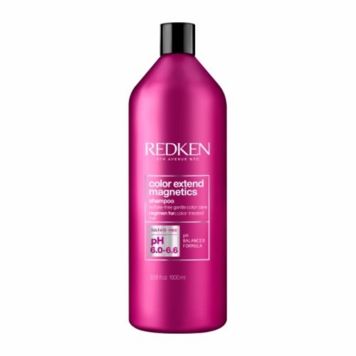 Bouteille REDKEN Color Extend Magnetics shampoing 1000 ml rose fuchsia avec bouchon noir pour cheveux colorés sur fond blanc.