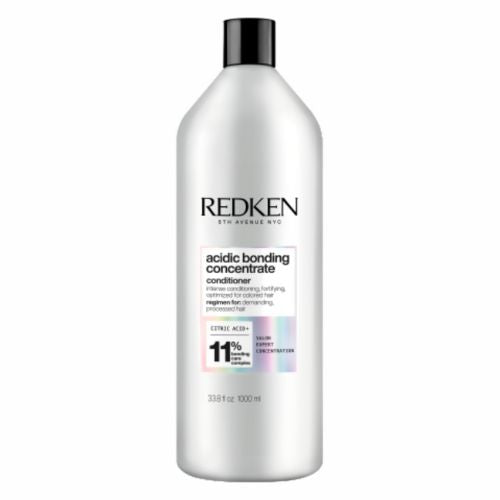 Bouteille REDKEN Acidic Bonding Concentrate après-shampoing 1000 ml grise avec étiquette pour cheveux abîmés sur fond blanc.