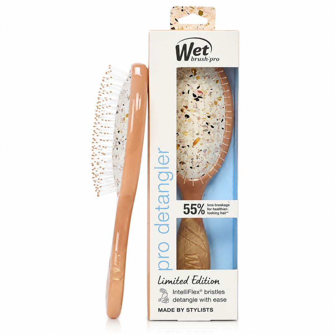 Brosse démêlante WET BRUSH® Pro Detangler champagne Édition Limitée avec emballage d'origine, picots IntelliFlex®, finition brillante, présentée sur fond blanc pour boutique en ligne.