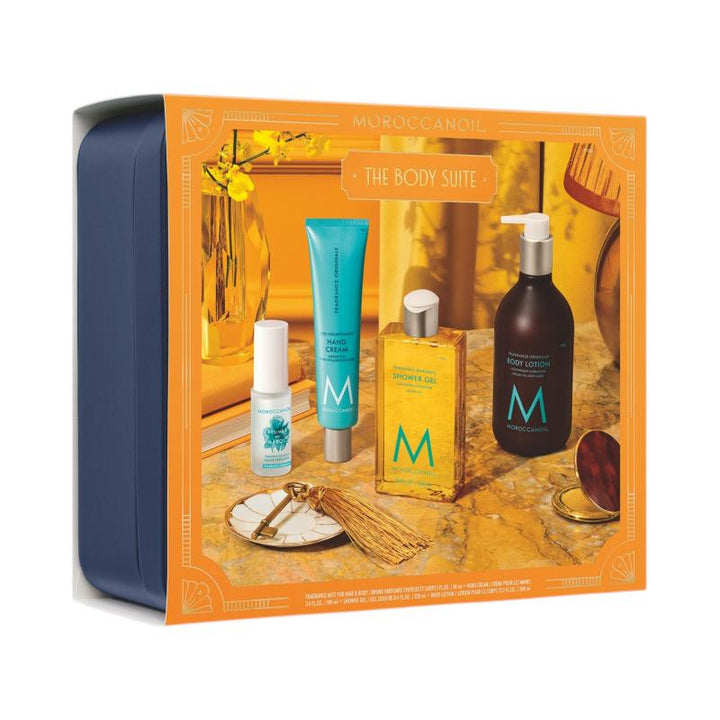 Coffret Moroccanoil Ensemble pour le corps avec gel douche, lotion corporelle, crème pour les mains et brume parfumée dans un emballage orange et bleu.