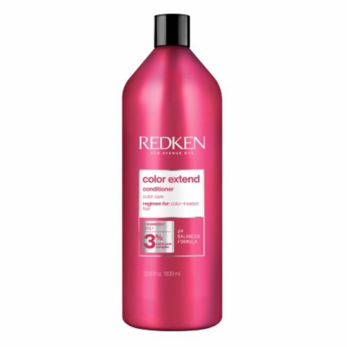 Après-shampooing Redken Color Extend format 1 litre en bouteille rouge, soin démêlant pour cheveux colorés, protège la couleur et apporte brillance, fond blanc.