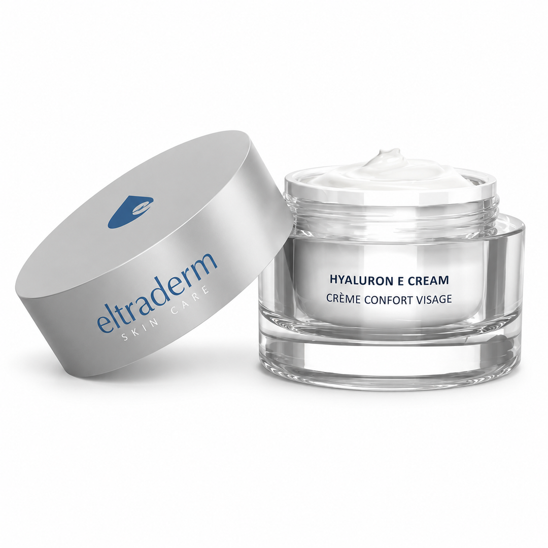 Crème hydratante Hyaluron E Eltraderm Skin Care 50 ml dans un pot en verre transparent avec couvercle argent mat et emballage blanc aux accents bleus, présentée sur fond blanc professionnel.