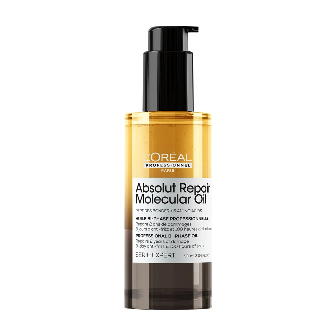 Huile capillaire L’Oréal Professionnel Absolut Repair Molecular Oil biphasée avec pompe noire et liquide doré dans flacon transparent sur fond blanc