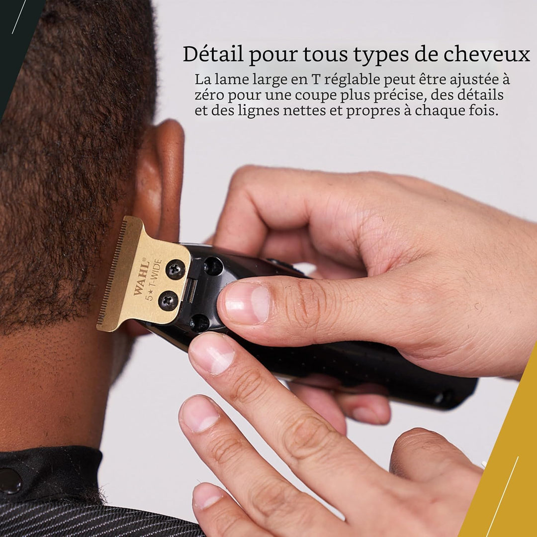 Tondeuse WAHL Detailer avec lame T-wide utilisée pour tracer les contours derrière l’oreille, coupe nette et précise sur cheveux courts.