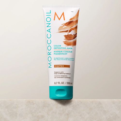 Le masque pigmentant copper de Moroccanoil dépose des pigments purs cuivrés qui ravivent, intensifient ou personnalisent temporairement la couleur.