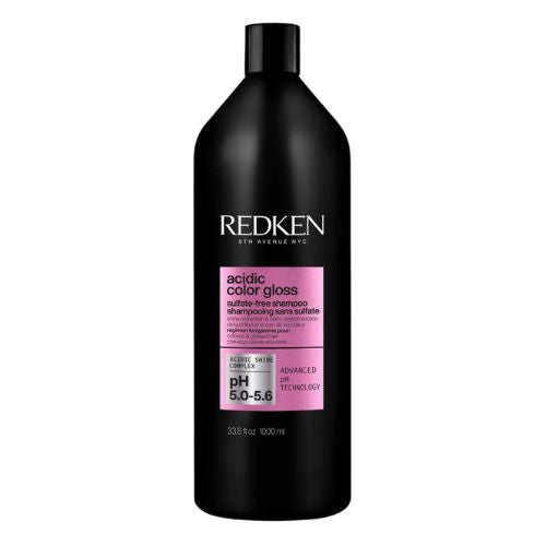 Bouteille REDKEN Acidic Color Gloss shampoing sans sulfate 1000 ml noire avec étiquette rose pour cheveux colorés.