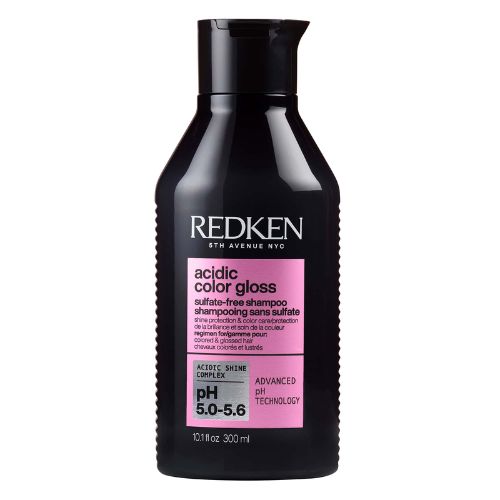 Flacon REDKEN Acidic Color Gloss shampoing sans sulfate 300 ml noir avec étiquette rose pour cheveux colorés sur fond blanc.