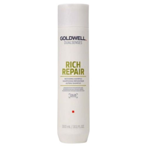 Shampooing Goldwell Rich Repair en format 300 ml. Bouteille blanche au design épuré avec logo doré, idéal pour réparer et protéger les cheveux colorés ou secs.