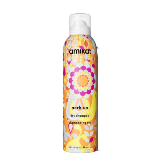 Flacon de shampooing sec Perk Up d'amika - Formule légère sans talc pour des cheveux frais et volumineux.