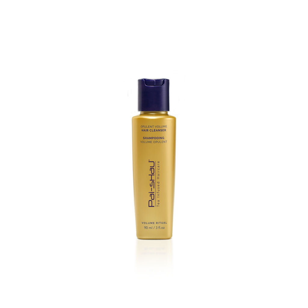 Flacon doré de 90 ml au bouchon violet du shampoing végétalien Pai-Shau Volume Opulent, format voyage, pour cheveux fins, gras ou colorés, sans sulfate.