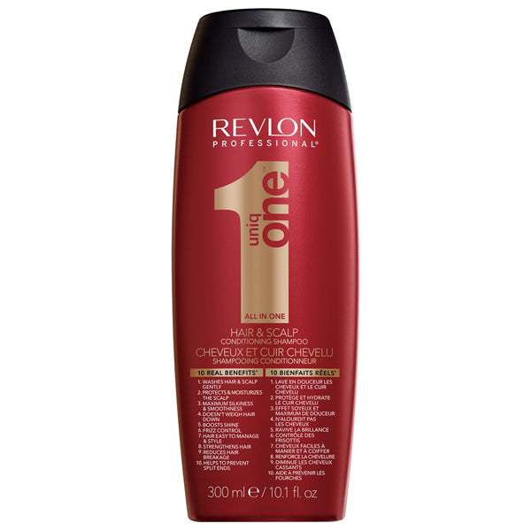 Flacon REVLON Uniq One Original 300 ml shampoing conditionneur, bouteille rouge avec inscription dorée et bouchon noir, présenté sur fond blanc.